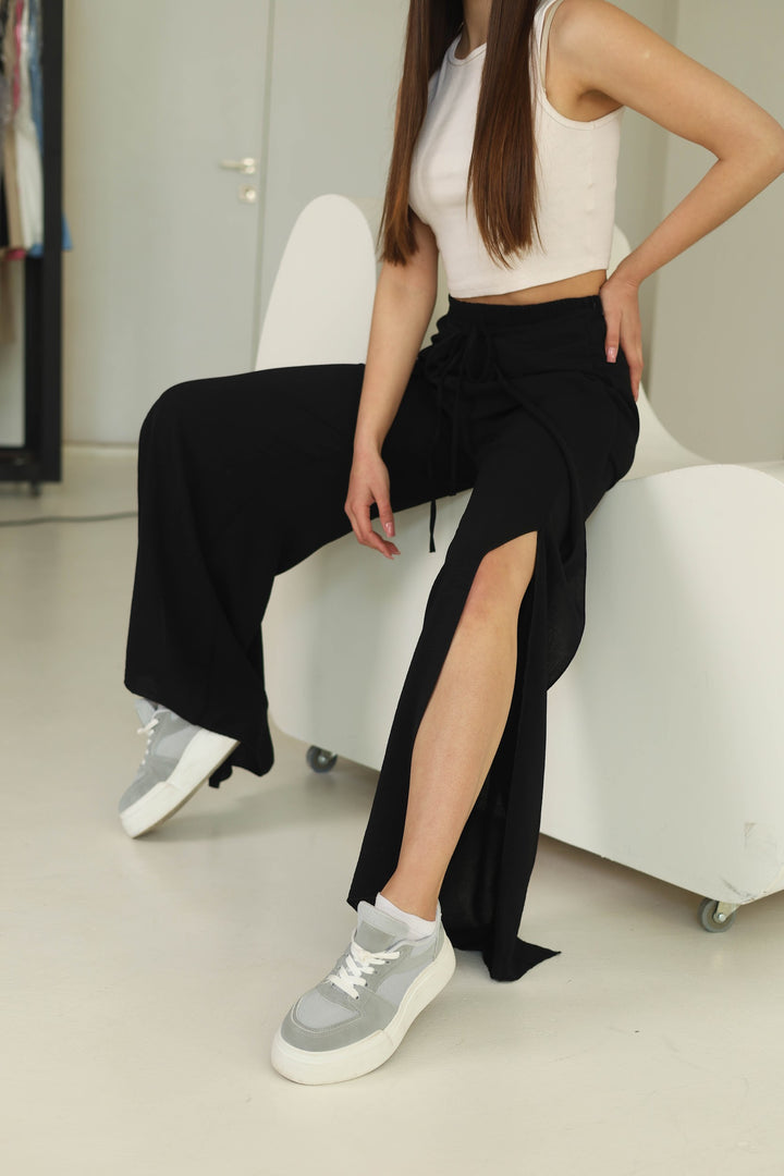 Black split front wide leg trousers