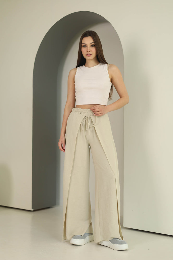 Beige split front wide leg trousers