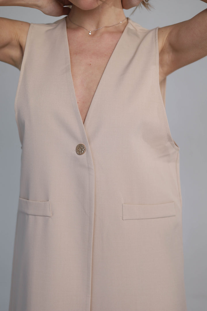 Sand-colored sleeveless maxi dress